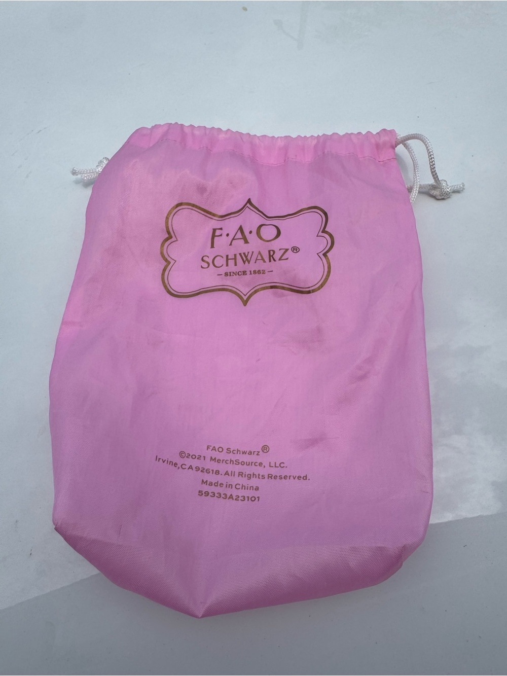 FAO Schwarz Pink Drawstring Pouch with Gold Logo